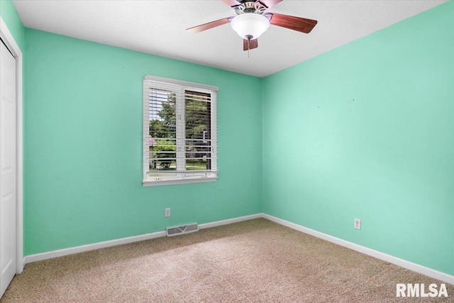 69 Axline Rd, Chatham, IL 62629 - empty room with carpet and ceiling fan