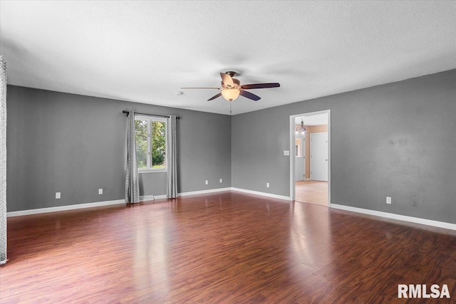 69 Axline Rd, Chatham, IL 62629 - spare room featuring ceiling fan, wood finished floors, and a textured ceiling