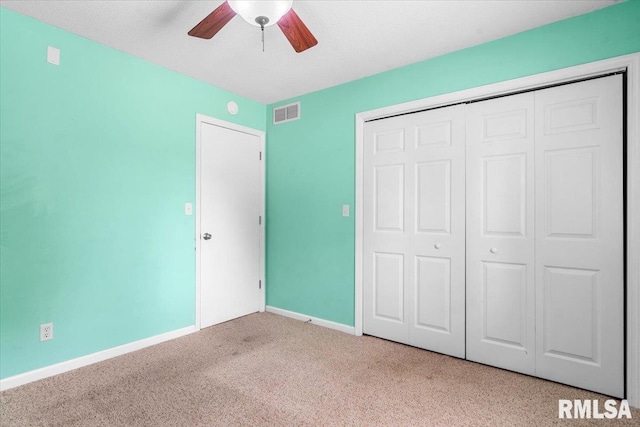 69 Axline Rd, Chatham, IL 62629 - unfurnished bedroom featuring carpet flooring, a closet, and ceiling fan