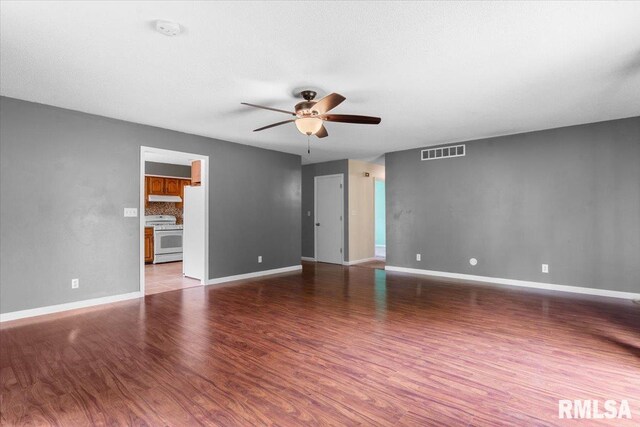 69 Axline Rd, Chatham, IL 62629 - empty room featuring ceiling fan, wood finished floors, and a smoke detector