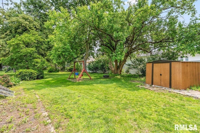 69 Axline Rd, Chatham, IL 62629 - view of grassy yard featuring a shed