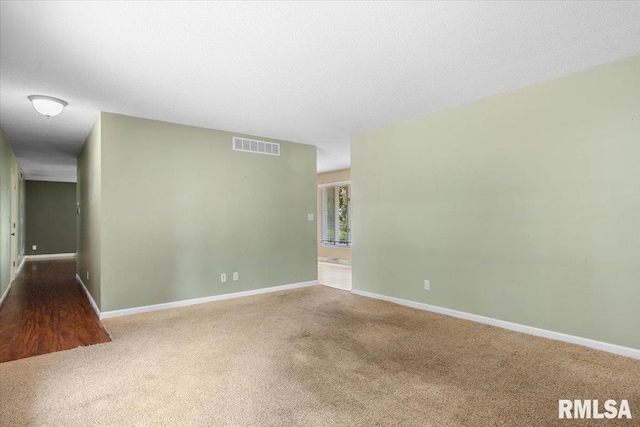 69 Axline Rd, Chatham, IL 62629 - carpeted empty room featuring baseboards