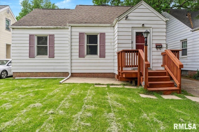 2639 S 8th St, Springfield, IL 62703 - view of front of house featuring a front lawn and roof with shingles