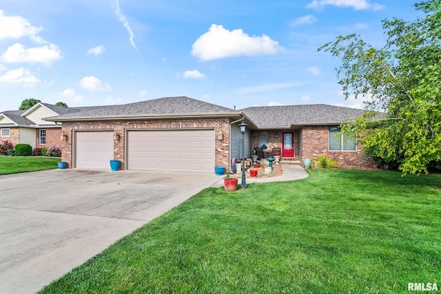 614 Willows Ave, Chatham, IL 62629 - single story home with an attached garage, concrete driveway, brick siding, a front yard, and roof with shingles