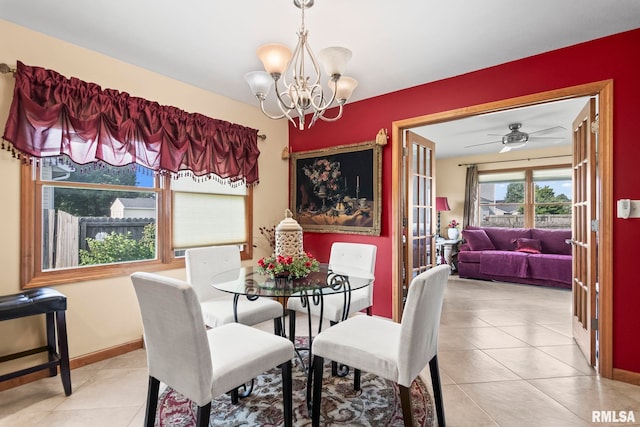 614 Willows Ave, Chatham, IL 62629 - tiled dining room with french doors, a chandelier, and a ceiling fan