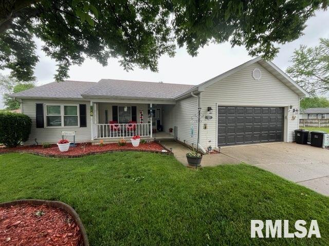 2405 Glencoe St, Springfield, IL 62704 - ranch-style house with a porch, an attached garage, concrete driveway, and a front lawn