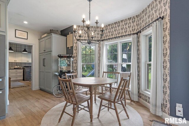 33 Vista Rdg, Petersburg, IL 62675 - dining space with light wood-style flooring, a chandelier, and recessed lighting