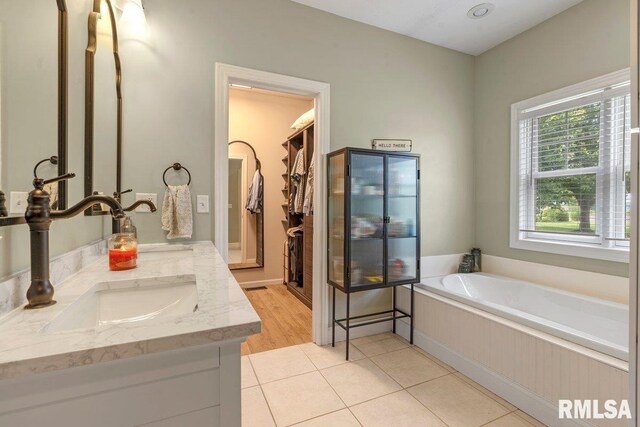 33 Vista Rdg, Petersburg, IL 62675 - full bathroom featuring double vanity, a bath, and tile patterned floors
