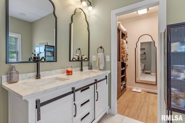 33 Vista Rdg, Petersburg, IL 62675 - bathroom with double vanity, wood finished floors, and toilet