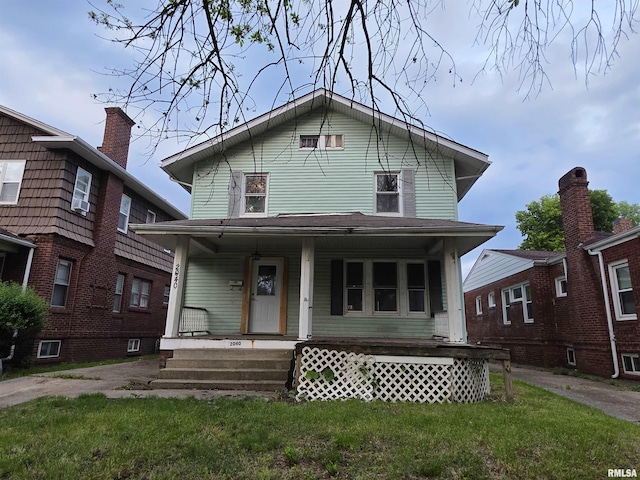 2040 S 5th St, Springfield, IL 62703 - view of front of house with covered porch and a front yard