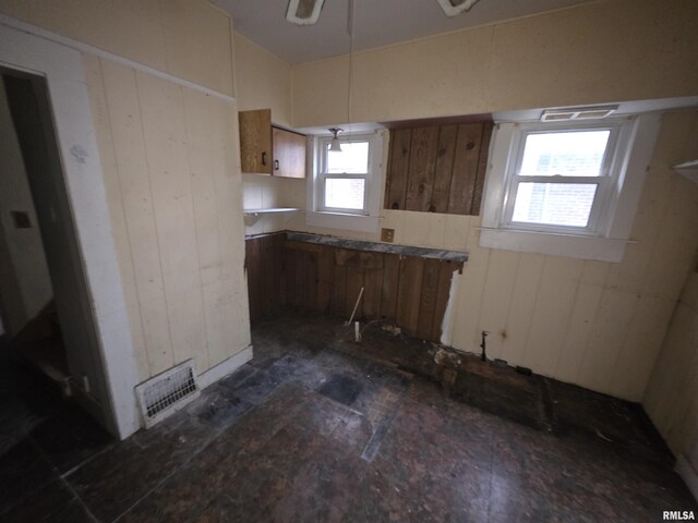 2040 S 5th St, Springfield, IL 62703 - kitchen featuring brown cabinets