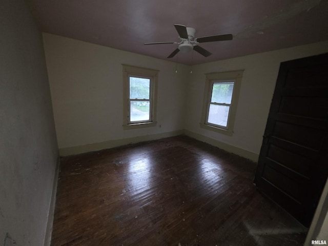 2040 S 5th St, Springfield, IL 62703 - empty room featuring hardwood / wood-style floors, baseboards, and ceiling fan