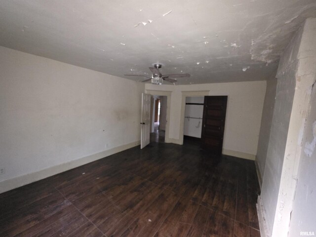 2040 S 5th St, Springfield, IL 62703 - unfurnished room with hardwood / wood-style floors, ceiling fan, and baseboards