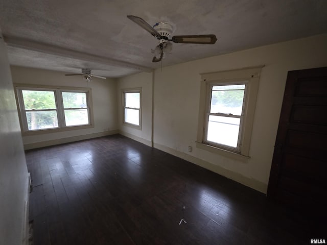 2040 S 5th St, Springfield, IL 62703 - unfurnished room with a ceiling fan, dark wood-style floors, and baseboards