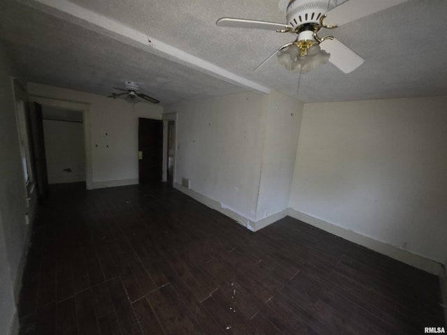 2040 S 5th St, Springfield, IL 62703 - unfurnished room featuring a ceiling fan, dark wood-style flooring, baseboards, and a textured ceiling