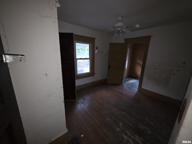 2040 S 5th St, Springfield, IL 62703 - empty room with ceiling fan, wood finished floors, and baseboards