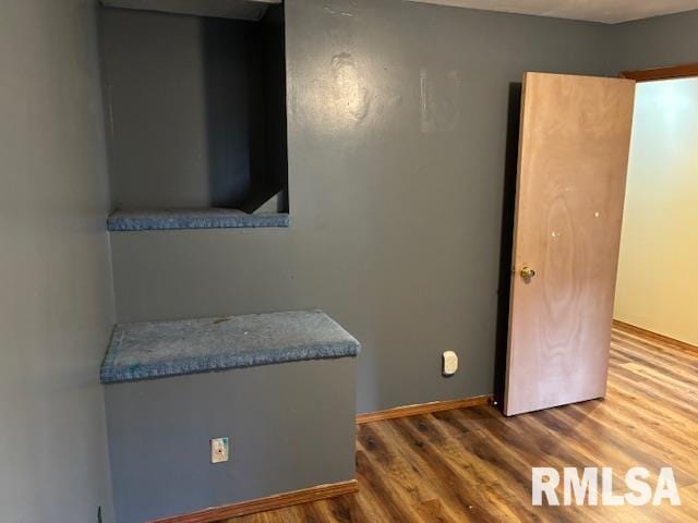 505 E Elm St, Carlinville, IL 62626 - bedroom featuring wood finished floors and baseboards