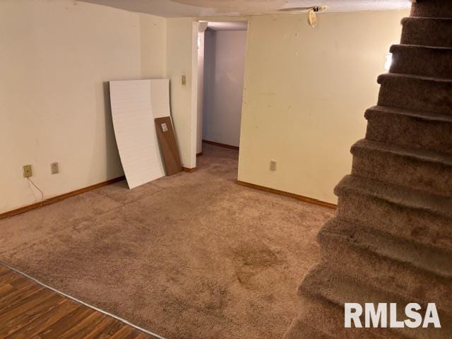 505 E Elm St, Carlinville, IL 62626 - unfurnished room featuring stairway, baseboards, and carpet