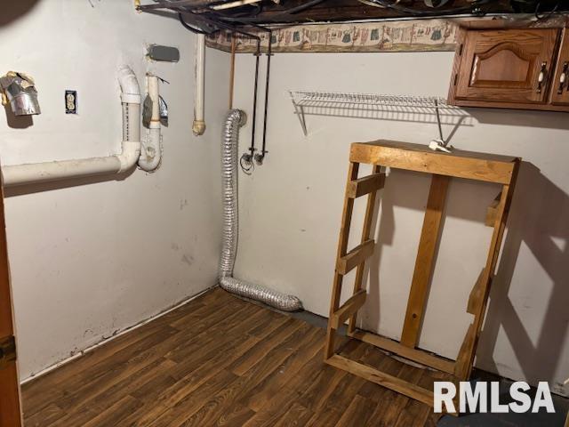 505 E Elm St, Carlinville, IL 62626 - unfinished basement with dark wood-type flooring