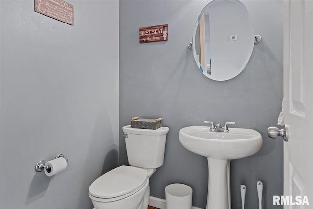 4108 Newtonmore Dr, Springfield, IL 62712 - half bathroom with toilet and a sink