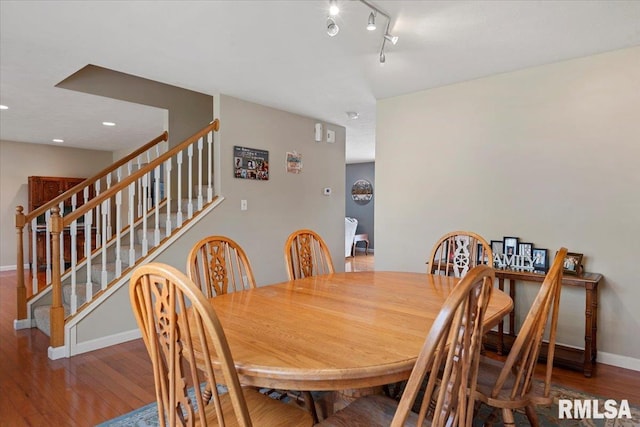 4108 Newtonmore Dr, Springfield, IL 62712 - dining area with wood finished floors, baseboards, stairs, recessed lighting, and rail lighting