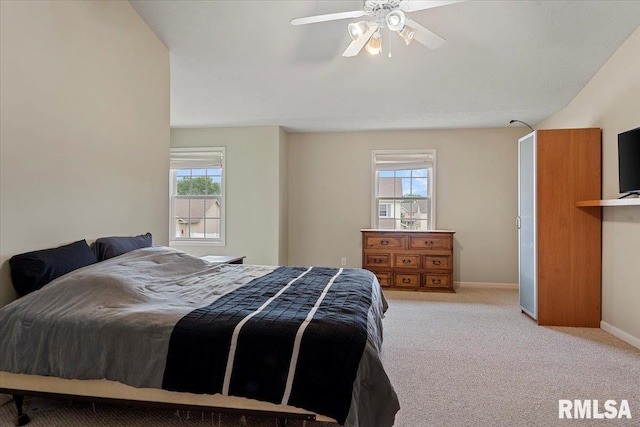 4108 Newtonmore Dr, Springfield, IL 62712 - carpeted bedroom featuring multiple windows, baseboards, and a ceiling fan