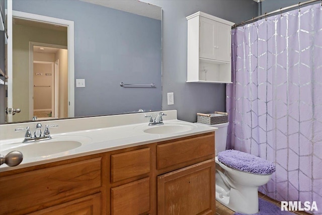 4108 Newtonmore Dr, Springfield, IL 62712 - full bathroom featuring toilet, double vanity, and curtained shower
