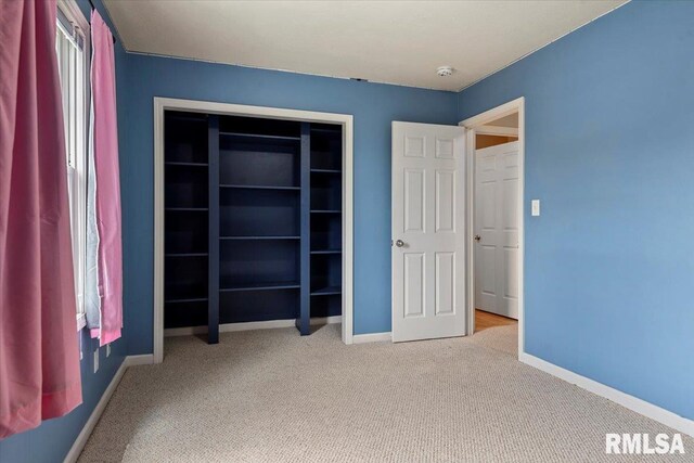 4108 Newtonmore Dr, Springfield, IL 62712 - unfurnished bedroom with carpet, baseboards, and a closet