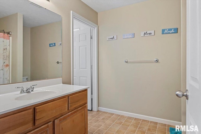 4108 Newtonmore Dr, Springfield, IL 62712 - full bathroom featuring vanity, baseboards, toilet, and a textured ceiling