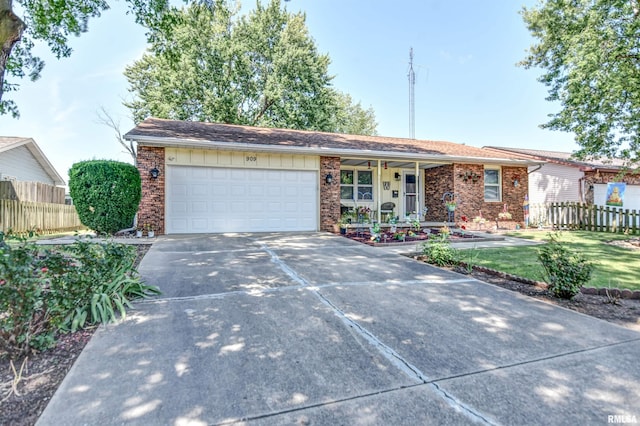 909 E Heights Ave, Taylorville, IL 62568 - single story home with brick siding, driveway, and a garage