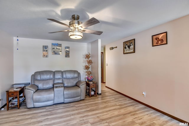909 E Heights Ave, Taylorville, IL 62568 - living area featuring ceiling fan and wood finished floors