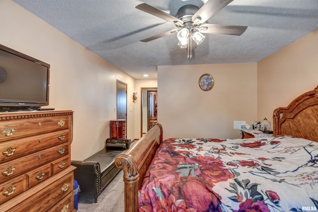 909 E Heights Ave, Taylorville, IL 62568 - bedroom with carpet flooring, a textured ceiling, and a ceiling fan