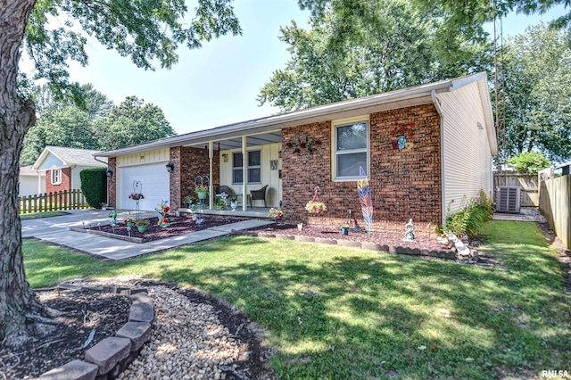 909 E Heights Ave, Taylorville, IL 62568 - ranch-style home featuring brick siding, an attached garage, covered porch, and driveway