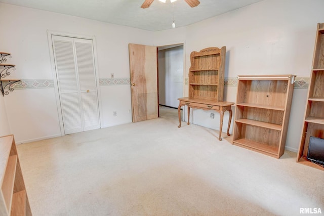 128 Macarthur Blvd, Pana, IL 62557 - unfurnished bedroom featuring carpet flooring, a closet, and a ceiling fan