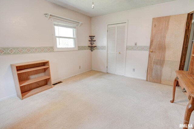 128 Macarthur Blvd, Pana, IL 62557 - unfurnished bedroom with carpet flooring and a closet