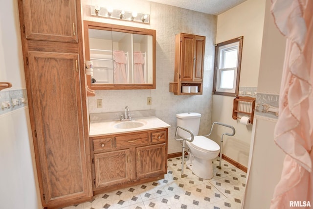 128 Macarthur Blvd, Pana, IL 62557 - full bath featuring vanity, tile walls, toilet, a shower with curtain, and tile patterned floors