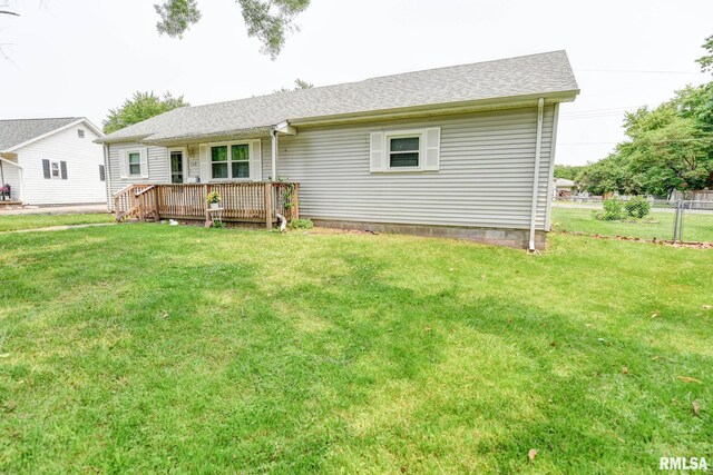128 Macarthur Blvd, Pana, IL 62557 - back of house featuring a wooden deck and roof with shingles