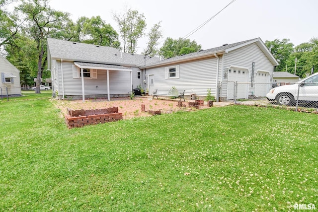 128 Macarthur Blvd, Pana, IL 62557 - rear view of property featuring a garage