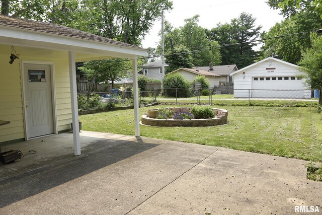 2531 Yale Blvd, Springfield, IL 62703 - view of yard with a garage and a patio