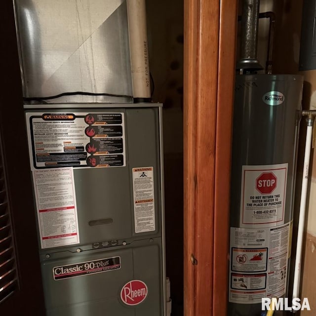 504 W Chestnut St, Chatham, IL 62629 - utility room with gas water heater and heating unit