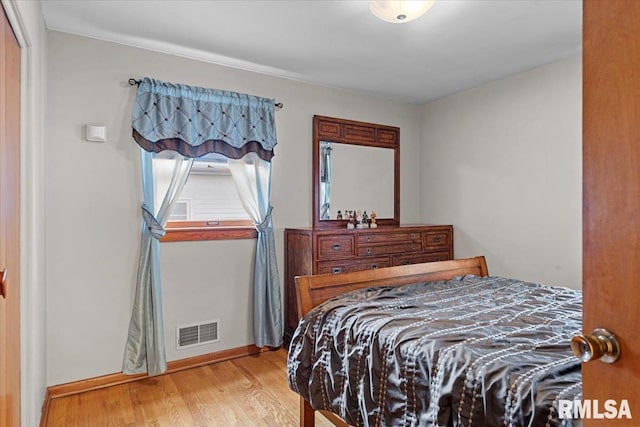 2054 Cambridge Rd, Springfield, IL 62704 - bedroom with baseboards and light wood finished floors
