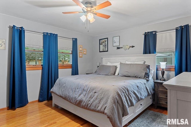 2054 Cambridge Rd, Springfield, IL 62704 - bedroom with light wood-style flooring and ceiling fan