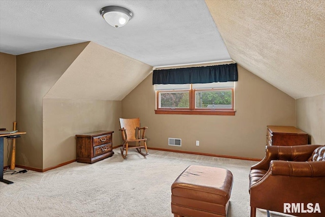 2054 Cambridge Rd, Springfield, IL 62704 - sitting room with a textured ceiling, carpet floors, lofted ceiling, and baseboards