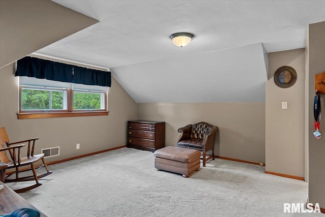 2054 Cambridge Rd, Springfield, IL 62704 - living area featuring baseboards, vaulted ceiling, and carpet floors