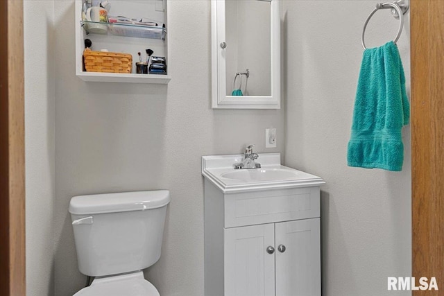 122 W Chapin St, Litchfield, IL 62056 - half bathroom featuring vanity and toilet