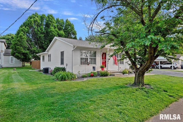 122 W Chapin St, Litchfield, IL 62056 - view of front of property with cooling unit, a front lawn, and driveway