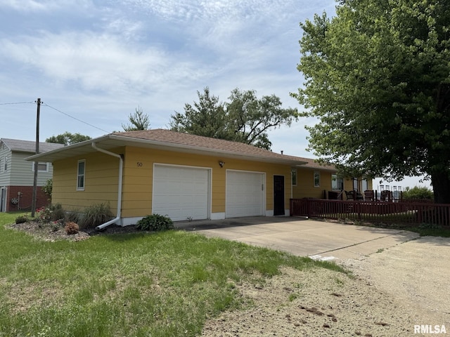 100 Fulton St, Oquawka, IL 61469 - ranch-style house with an attached garage