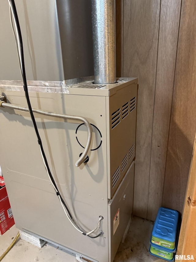 100 Fulton St, Oquawka, IL 61469 - detailed view of heating unit and concrete flooring