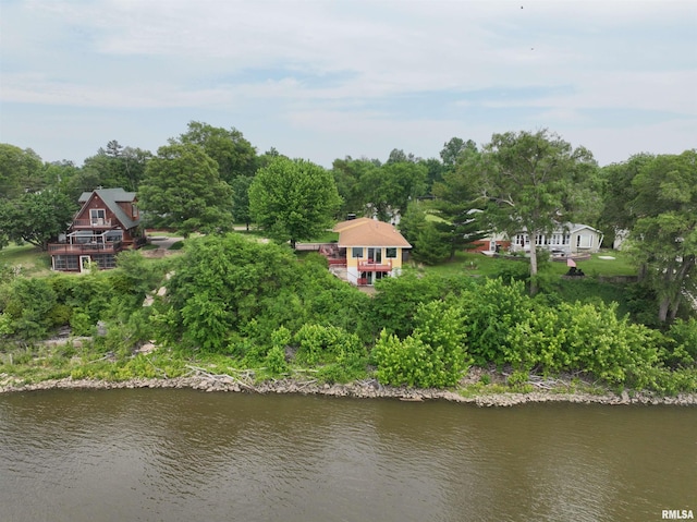 100 Fulton St, Oquawka, IL 61469 - aerial view of property and surrounding area with a nearby body of water and a tree filled landscape