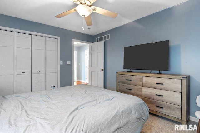 136 Lilac Ln, Chatham, IL 62629 - bedroom with a closet, a ceiling fan, light carpet, and baseboards